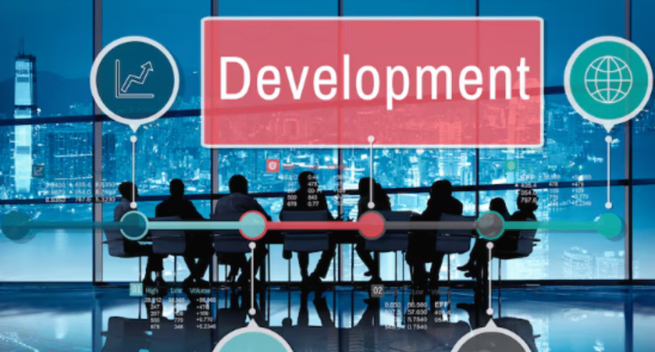 Software development team collaborating on a successful project